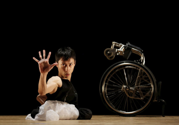Kenta Kambara, 34, performs onstage during 'Challenge & Move' a dance event in Tokyo, Japan, February 8, 2020. Kambara who was born with spina bifida, a disorder that paralysed his lower body, aims to perform at the Tokyo 2020 Paralympics opening or closing ceremonies. "If you can't walk with your legs, it's okay to walk with your hands. If there is something you want to do but cannot, it's okay to find another way," he said. REUTERS/Kim Kyung-Hoon TPX IMAGES OF THE DAY.  SEARCH "WHEELCHAIR DANCER" FOR THIS STORY. SEARCH "WIDER IMAGE" FOR ALL STORIES. - RC2ZGF9XZ83P